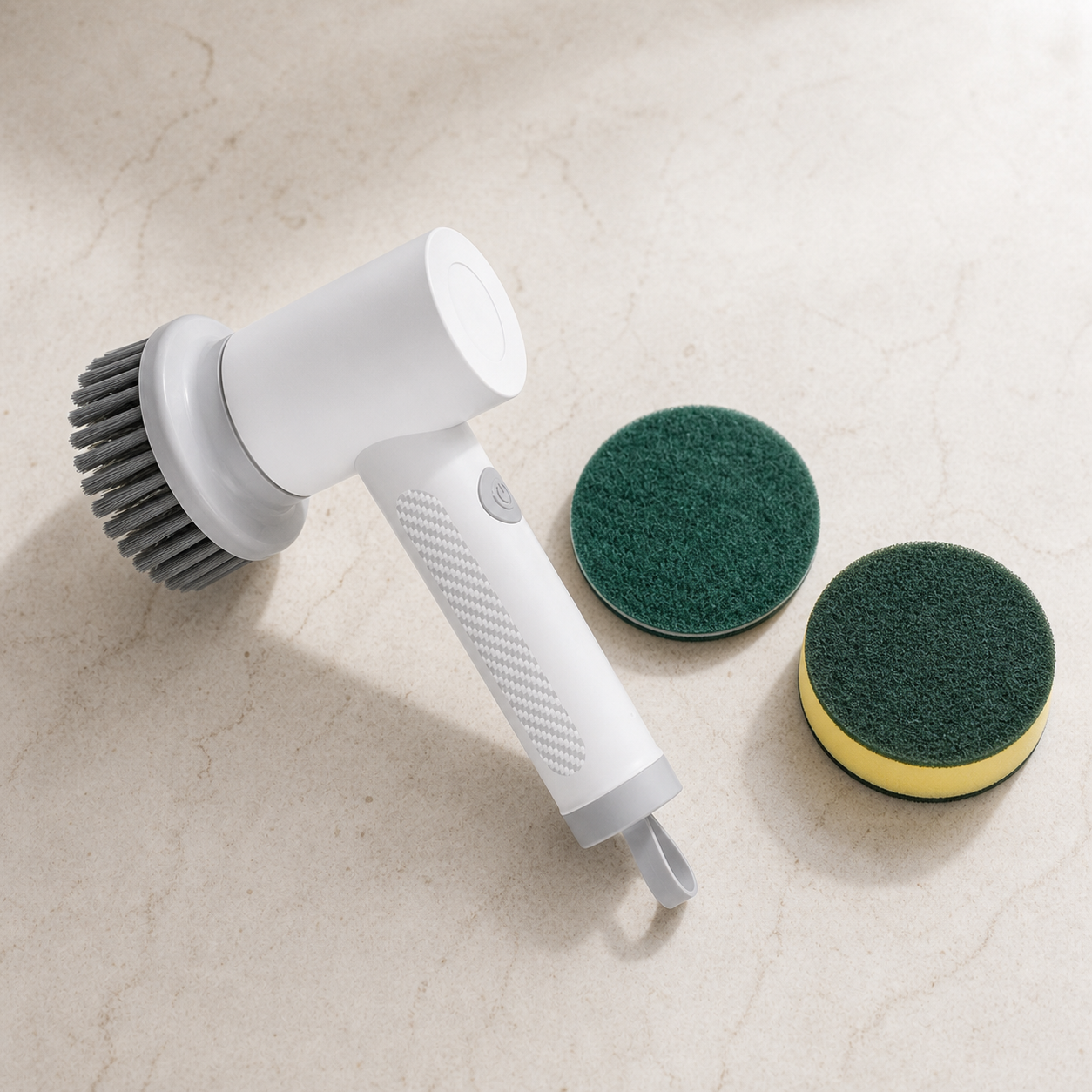 Three cleaning heads: flat bristle brush, scouring pad, and scrub sponge